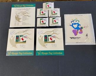 c.1992 Olympic Flag Celebration Program Signed by Athletes, 5 Olympic Stickers, and 3 of the '92 Olympic Official Logos 