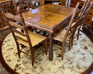 Antique Oak Table with Carved Edges and Legs, with Rush Seat Ladder-back Chairs