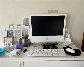 Apple Monitor, keyboard, mouse, miscellaneous office supplies