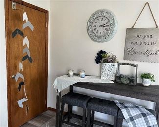 Black mini bar with 3 stools