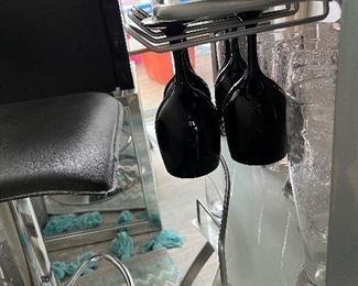 Glass top mini bar with three stools