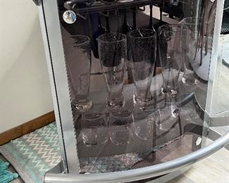 Glass top mini bar with three stools