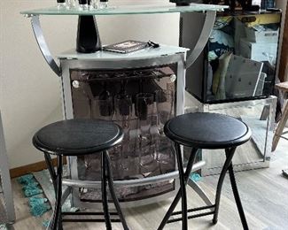 Glass top mini bar with three stools