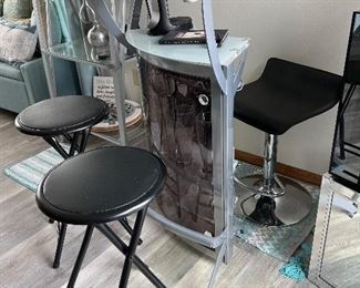 Glass top mini bar with three stools