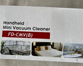 Handheld mini vacuum cleaner