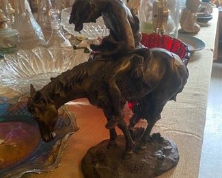 Cowboy on horse statue 