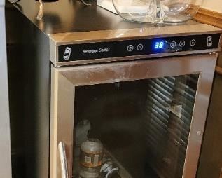 Wine Fridge, decanters and serve sets