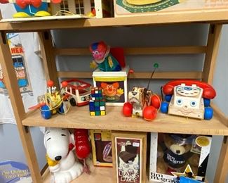 Variety of vintage and newer collectible toys including Fischer Price.