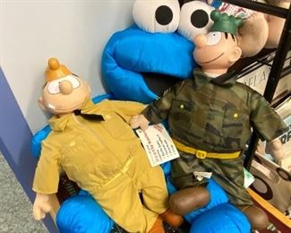 Cookie Monster snuggled with Beetle Bailey characters 