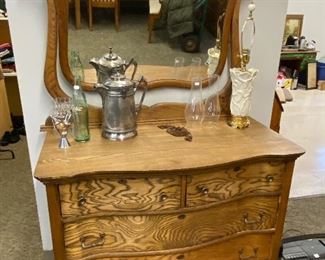 Antique oak dresser with a slight serpentine front  and mirror
