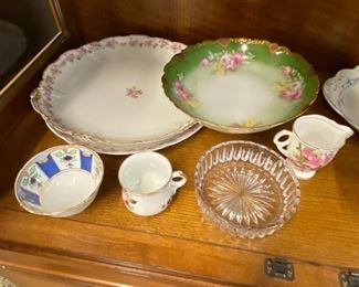 Many antique plates and serving pieces