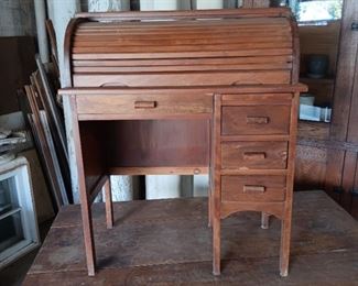 Child-size tambour top desk...
