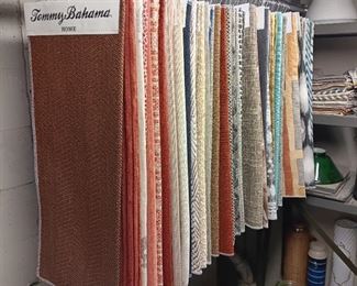 Large selection of hanging and folded fabric samples, folded fabric scraps and yardage...
