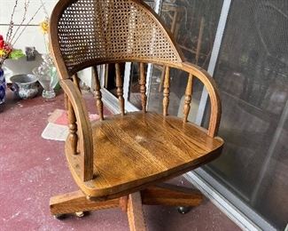 Mcm rattan and wooden rolling swivel chair