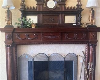 Ornately carved  and mirrored Victorian mantle topper if not attached to the fire place.