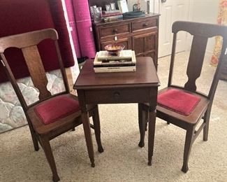 Matching chairs; small table