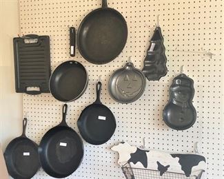 Iron skillets; cake pans