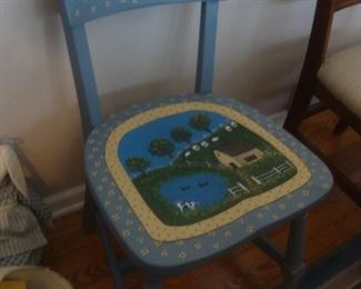 Chair with painted farm scene