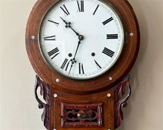 Anglo-American wall clock with key                                    
 27"H x 16.5" W x 5"D