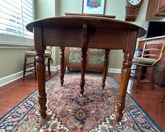 42"H table with 4 removable leaves