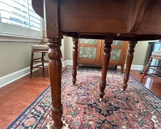 42"H table with 4 removable leaves