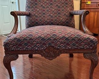 French Mahogany carved arm lounge chair                                             
38"H x 27.5"W x 26.25"D