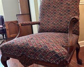 French Mahogany carved arm lounge chair                                             
38"H x 27.5"W x 26.25"D