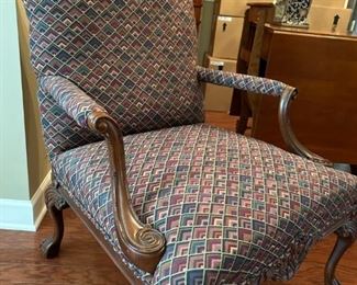 French Mahogany carved arm lounge chair                                             
38"H x 27.5"W x 26.25"D