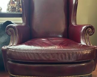 Leather burgandy wing chair: 42.5"H x 32"W x 5"D