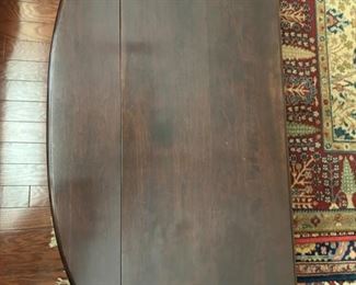Oval drop leaf coffee table: 17.5"H x 32"W x 19"D