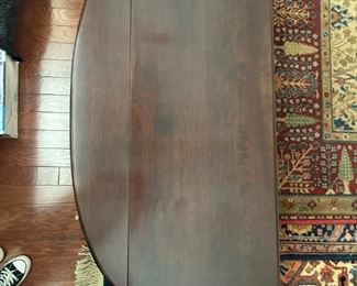 Oval drop leaf coffee table: 17.5"H x 32"W x 19"D