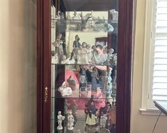 Curio cabinet with overhead light                                           78"H x 26" W x 14.5"D