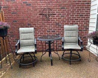 Patio set                                                                                               
Table: 34" H x 32" round                                                                  Swivel Chairs: 47.25"H x 24" W x 23.5" D    