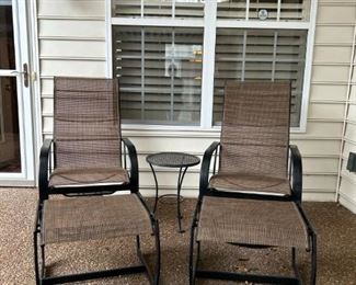 Patio chairs with matching ottomans.                             
Chairs: 44.5"H x 25"W x 626.5"D                             
Ottomans: 16"H x 23"W x 21"D