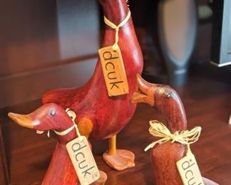 Hand-carved whimsical duck family