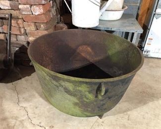 Cast iron marked 30 , we have a matching smaller one.