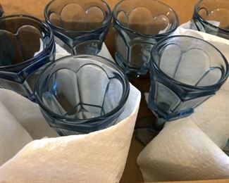 Blue drinking glasses, every size