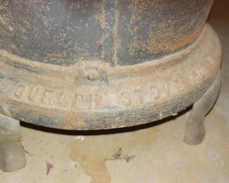 Cast iron stove with nickel rim