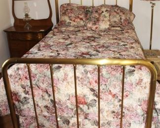 The mattress and box springs on this full size bed is very new and clean.  Homeowner says this bed has been slept on TWICE! 