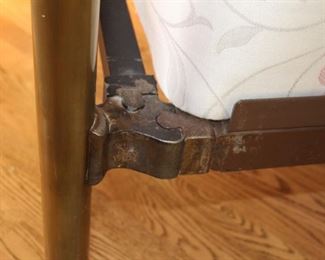 Frame details of brass bed.