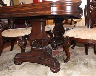 Pedestal bases and close up of dining chair legs.