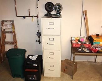 File cabinet and office supplies.