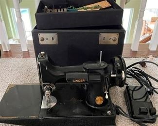 Antique (1950s) Singer Featherweight portable sewing machine with carrying case
