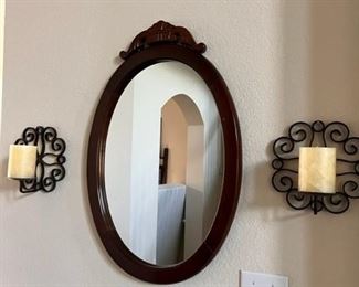 Oval cherry wood mirror and two wall candle holder sconces