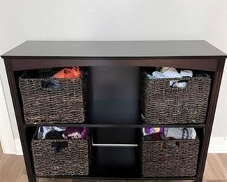 Black two-shelf storage unit with square wicker baskets