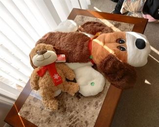 Top down view of the faux marble top hardwood coffee table, and some stuffed animals,