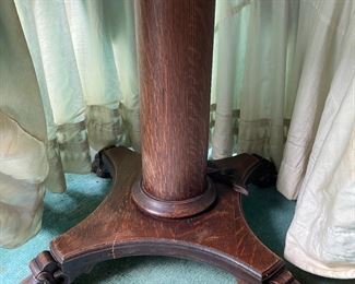 Antique oak table under skirt