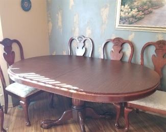 Table always covered with 6 chairs