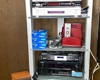 Panasonic VHS player, Denton In-Command Receiver, Sony 5 DVD/ CD Changer, Pioneer VHS/DVD P...
