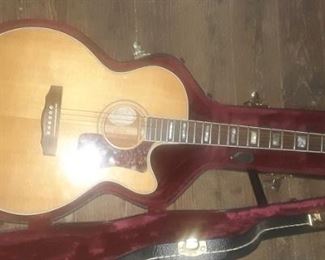 Guild f47ce. Its used and a piece of white trim needs glue. $600 FIRM. 

